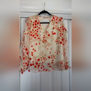 Spring blouse with ruffled sleeve detail